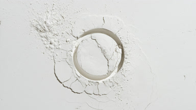 Circular Imprint on White Powder Layer for Calcium Carbonate Ad