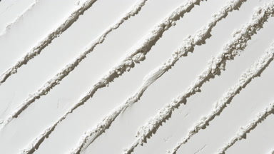 Dynamic Shadow on White Powder Surface with Palette Knife Trails
