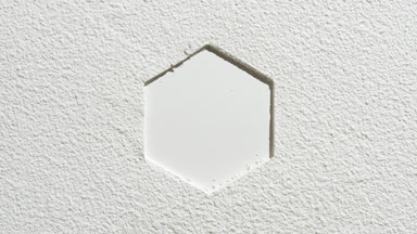 Hexagonal Imprint on Fine Powder with Orbiting Light