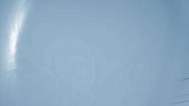 Time-Lapse of Pale Blue Surface Drying with Mudcracks