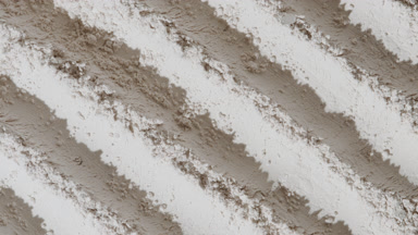White Powder Surface with Furrows and Shifting Shadows