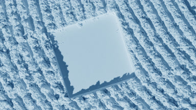 Pale Blue Powder Surface with Shifting Shadows from Above