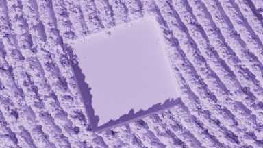 Violet Powder Surface Illuminated by Rotating Light