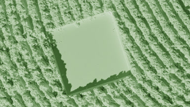 Pale Green Powder Surface with Changing Shadows from Above