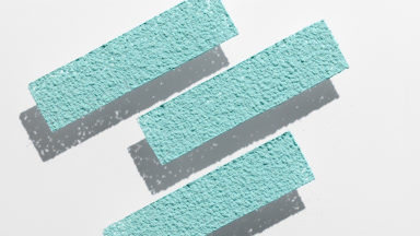 Light Cyan Powder Sifted Through Stencil with Shadows
