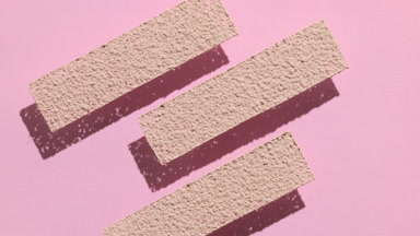 Beige Powder Sifted Through Stencil for Ad Campaign