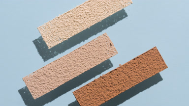 Dynamic Shadows of Skintone Powder on Pastel Blue