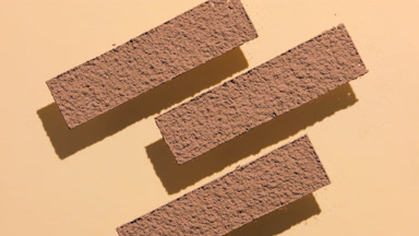 Brown Powder Stripes on Transparent Surface