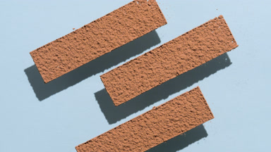 Brown Powder Stripes on Transparent Surface