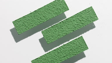Green Powder Stripes on Subtle Grey Surface