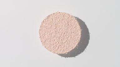 Beige Powder Circle Creating Shadows on Light Grey for Branding