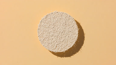 Dynamic Beige Powder Shadow on Transparent Surface
