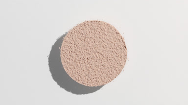 Dynamic Beige Powder Shadow on Light Gray Surface