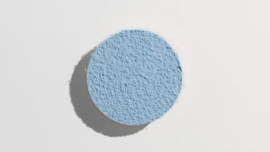 Fluctuating Shadow of Pale Blue Powder on Grey Background