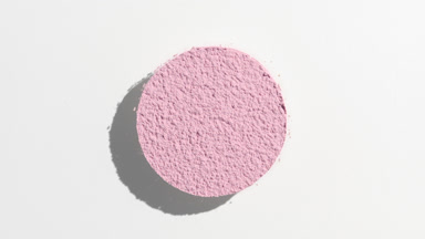Light Pink Powder Shadow on Soft Gray Surface