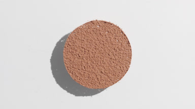 Lively Shadow of Brown Powder on Pale Gray Canvas