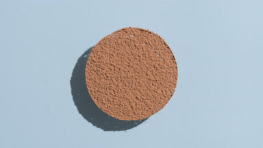 Brown Powder Sifting in Circle with Morphing Shadows