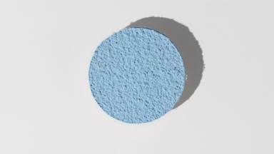 Soft Blue Powder Circle Projecting Dynamic Shadow on Grey