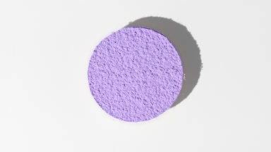 Violet Powder Sifting into Circle with Lively Shadow Effect