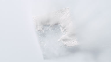 Elegant White Powder Sifting on Gray Canvas in Slow Motion