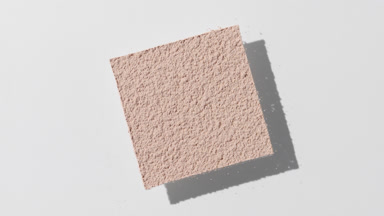 Moving Shadow Play of Beige Powder on Light Gray