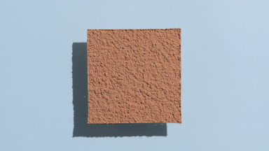 Flowing Brown Powder on Baby Blue Background