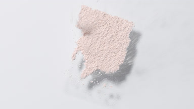 Slanted Beige Powder Motion on Gentle Grey Background