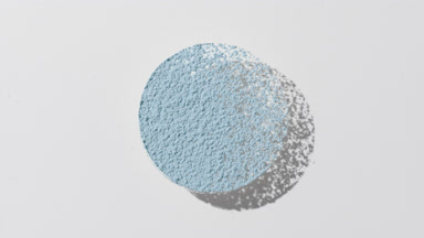 Pale Blue Powder Circle Creating Dynamic Shadow on Grey