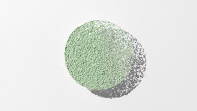 Pale Green Powder Circle Casting Dynamic Shadow on Grey