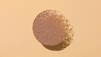 Brown Powder Shadow on Transparent Beige Surface