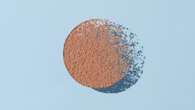 Dynamic Shadows of Brown Powder on Beige Backdrop