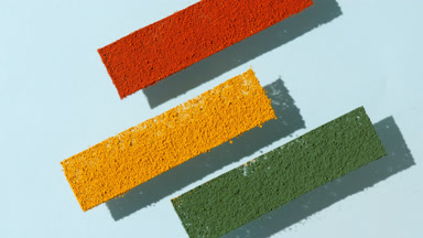 Colorful Powder Stripes on Transparent Surface in Pale Blue