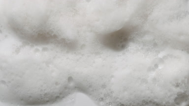 Dynamic Shadows on White Soap Sud Surface