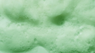Pale Green Surface with Shifting Shadows