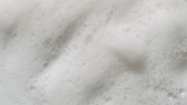 Changing Shadows on White Foam Surface