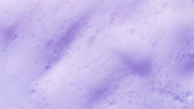 Violet Surface with Gentle Rises and Shifting Shadows