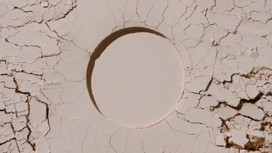 Beige Powder Surface with Cracks and Imprint