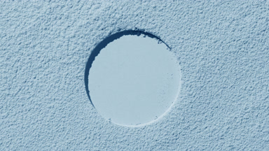 Shadow Movement on Delicate Pale Blue Sifted Powder Surface