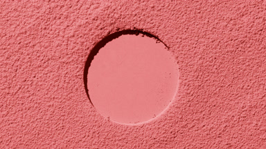 Dynamic Red Powder Surface with Rotating Light Effects