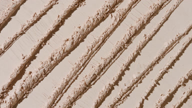 Beige Powder Surface with Knife Lines and Dynamic Shadows