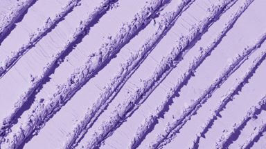 Violet Powder Surface with Overlapping Knife Trails
