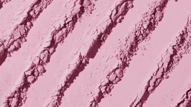 Pastel Pink Powder Surface with Scraping Patterns and Light