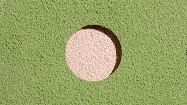 Beige Powder Texture with Green Sifted Accents and Shadows