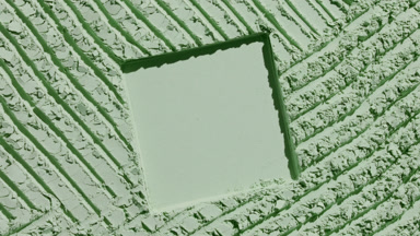 Dynamic Light on Pale Green Powder Surface with Imprint