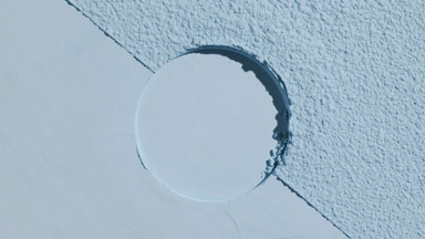 Dynamic Shadows on Pale Blue Powder with Round Imprint