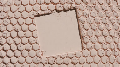 Beige Powder Surface with Honeycomb Pattern and Square Imprint
