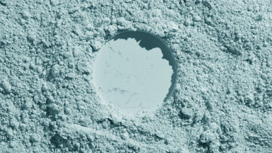 Pale Cyan Powder Surface with Stamped Round Mark and Shadows