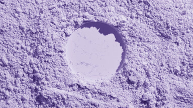 Violet Powder Surface with Round Pressed Mark and Shadows