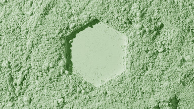 Pale Green Powder Surface with Hexagonal Imprint and Shadows