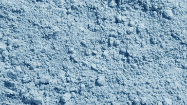 Dynamic Shadows on Pale Blue Loose Powder Surface